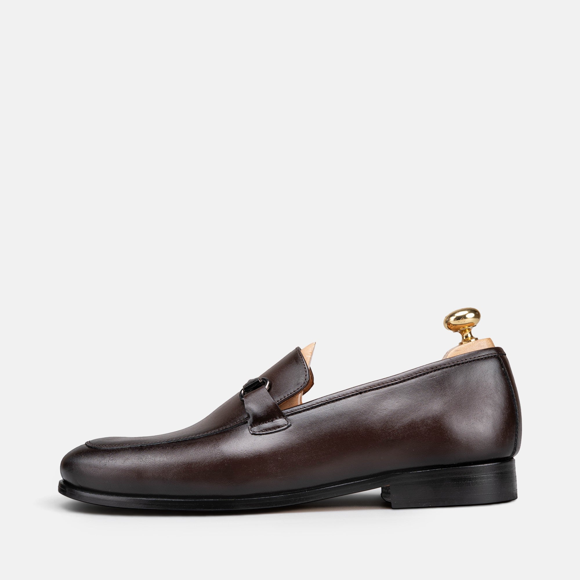 VOLZAK brown leather loafer with a metal bit detail and leather sole, side view