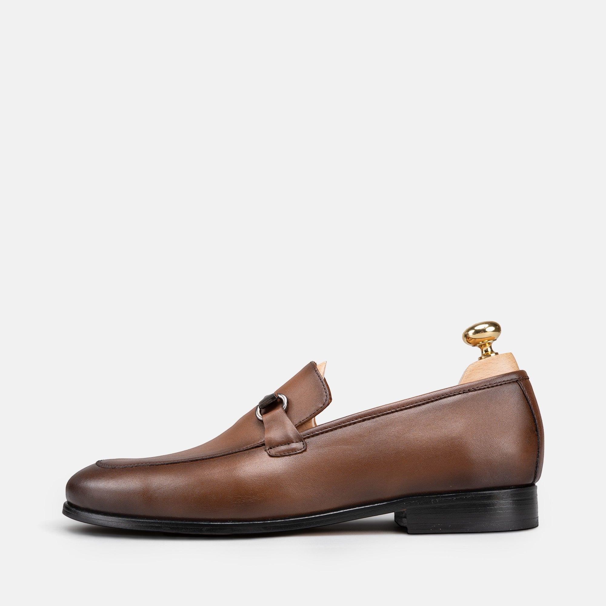 VOLZAK vintage brown leather loafer with a metal bit detail and leather sole, side view