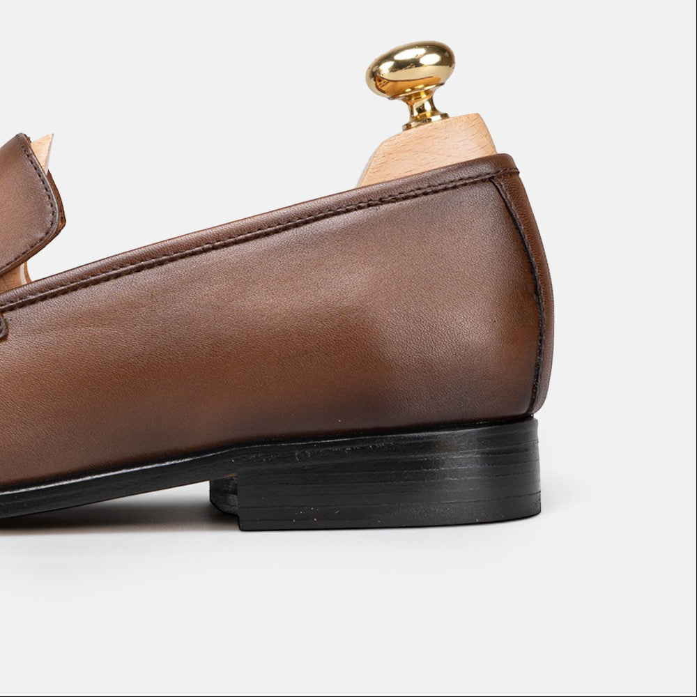 VOLZAK vintage brown leather loafer shoe with a stacked black heel and wooden shoe tree insert