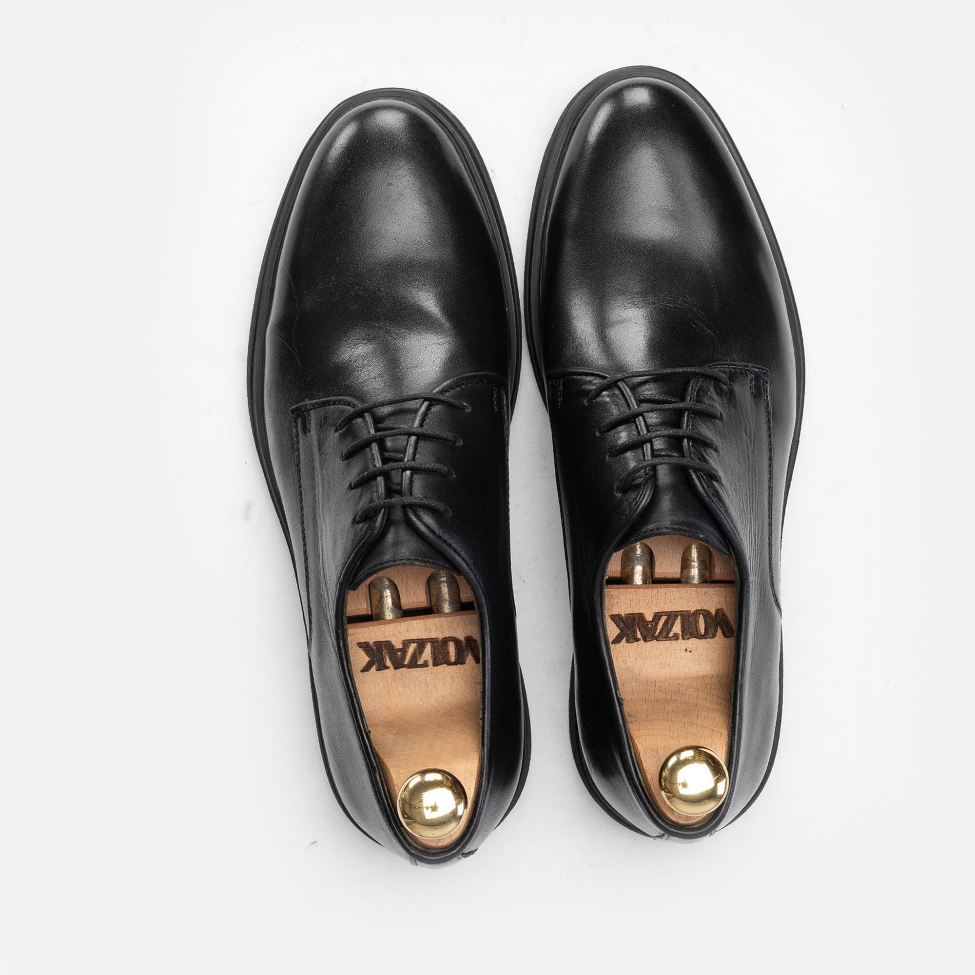 ''330 Chaussure en cuir Noir