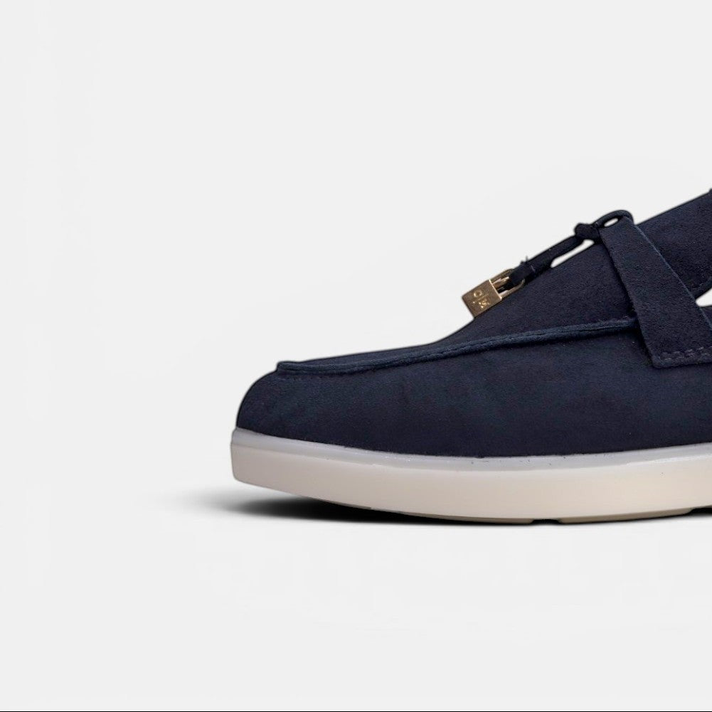 VOLZAK blue suede moccasin with a white rubber sole and gold-toned metal hardware detail