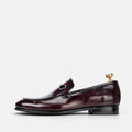 VOLZAK bordeaux leather loafer with a metal bit detail and leather sole, side view