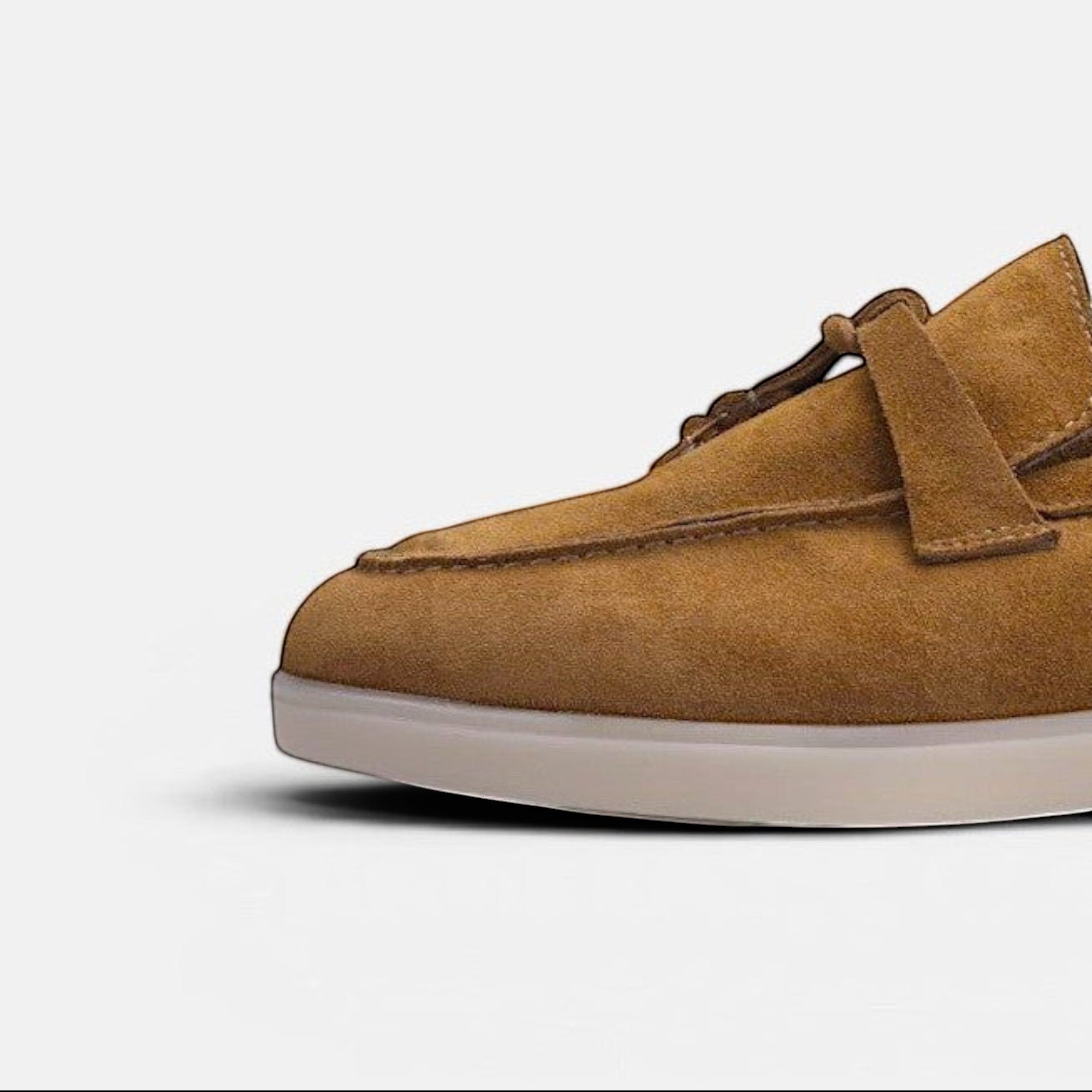 VOLZAK camel suede moccasin with a durable rubber sole, showcasing detailed stitching and premium leather lining.