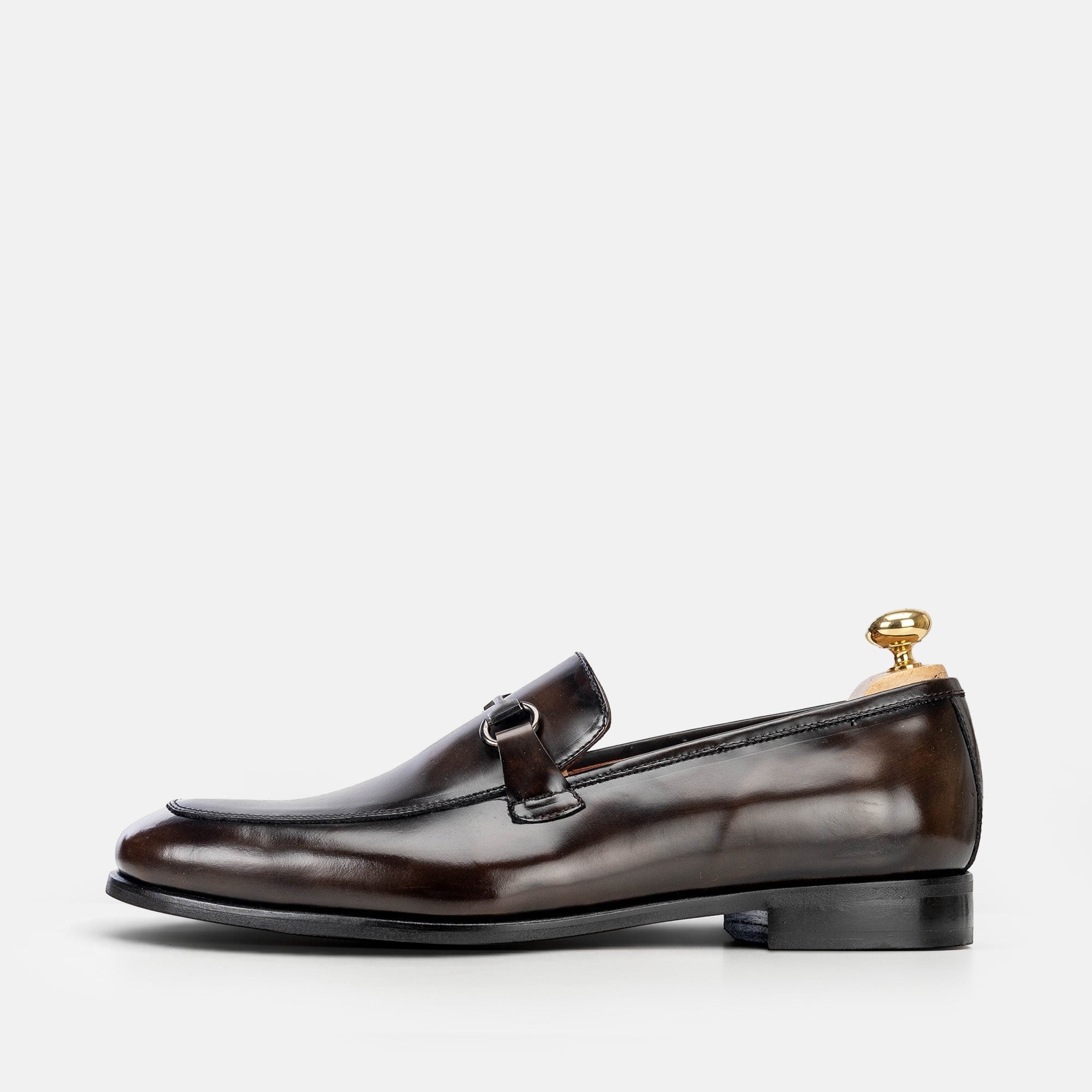 VOLZAK vintage brown leather loafer with a metal bit detail and leather sole, side view
